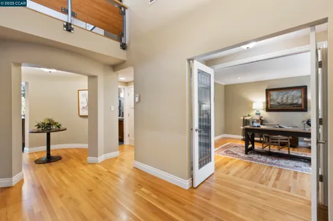 a workspace with furniture and wooden floor