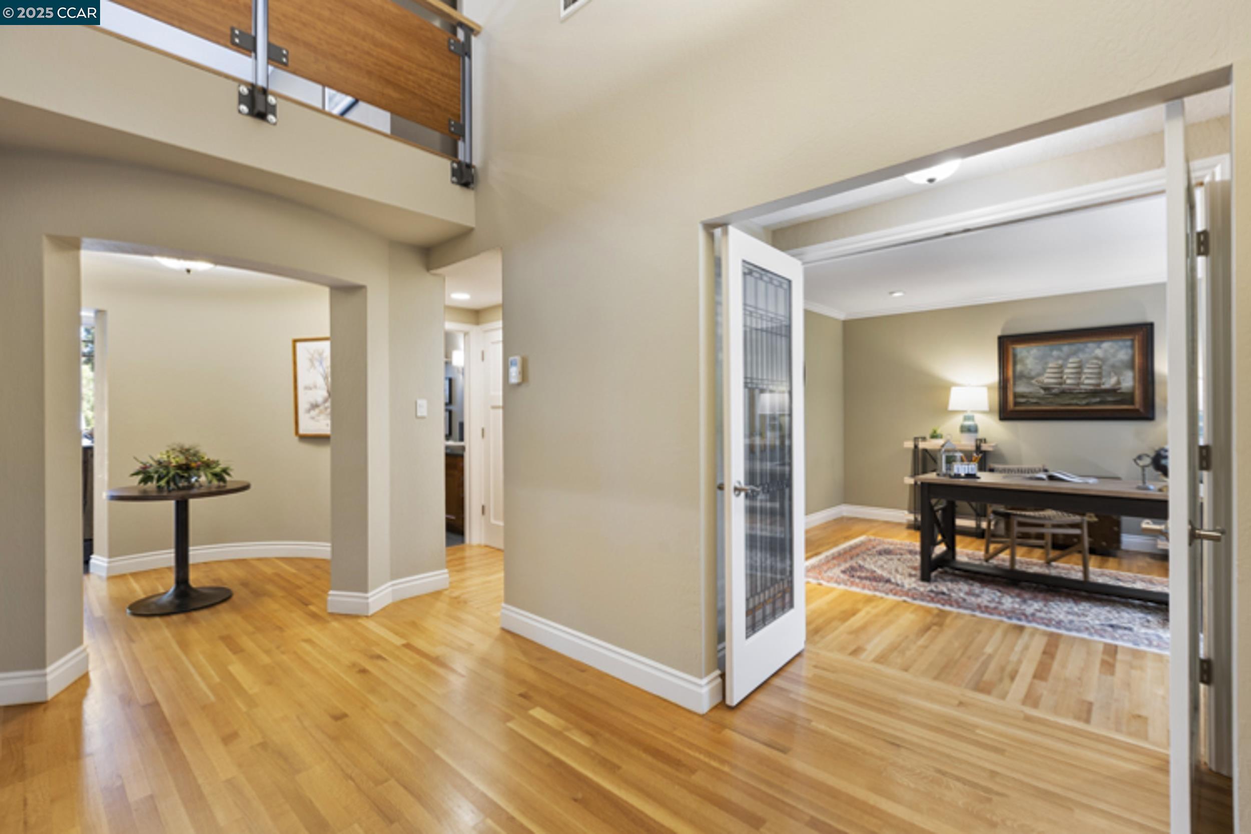 350 Pine Creek Road Walnut Creek, CA 94598 - Photo 8 of 59 a view of a livingroom with wooden floor and furniture