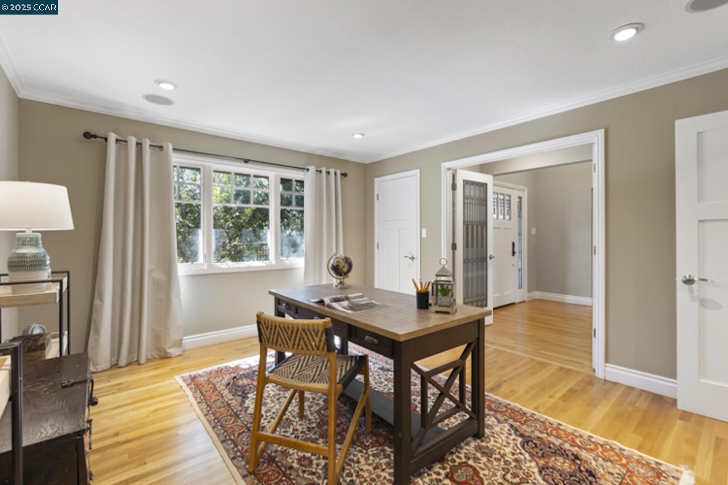 350 Pine Creek Road Walnut Creek, CA 94598 - Photo 9 of 59 a workspace with furniture and wooden floor
