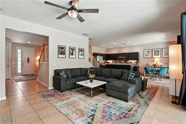 a living room with furniture and a couch