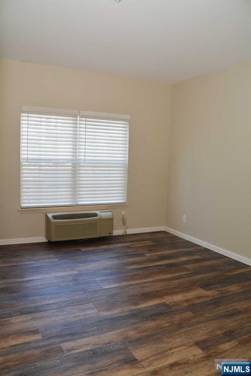 2 Richmond Road, Unit 110 West Milford, NJ 07480 - Photo 19 of 45 a view of a room with wooden floor and a window