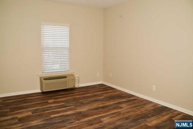 2 Richmond Road, Unit 110 West Milford, NJ 07480 - Photo 21 of 45 a room with a window and a ceiling fan