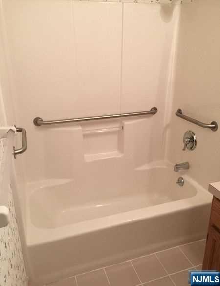 2 Richmond Road, Unit 110 West Milford, NJ 07480 - Photo 26 of 45 a bathroom with a bathtub