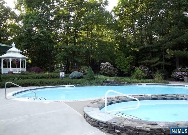 2 Richmond Road, Unit 110 West Milford, NJ 07480 - Photo 34 of 45 a view of a swimming pool with a yard