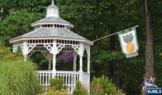 2 Richmond Road, Unit 110 West Milford, NJ 07480 - Photo 37 of 45 a front view of a house with yard