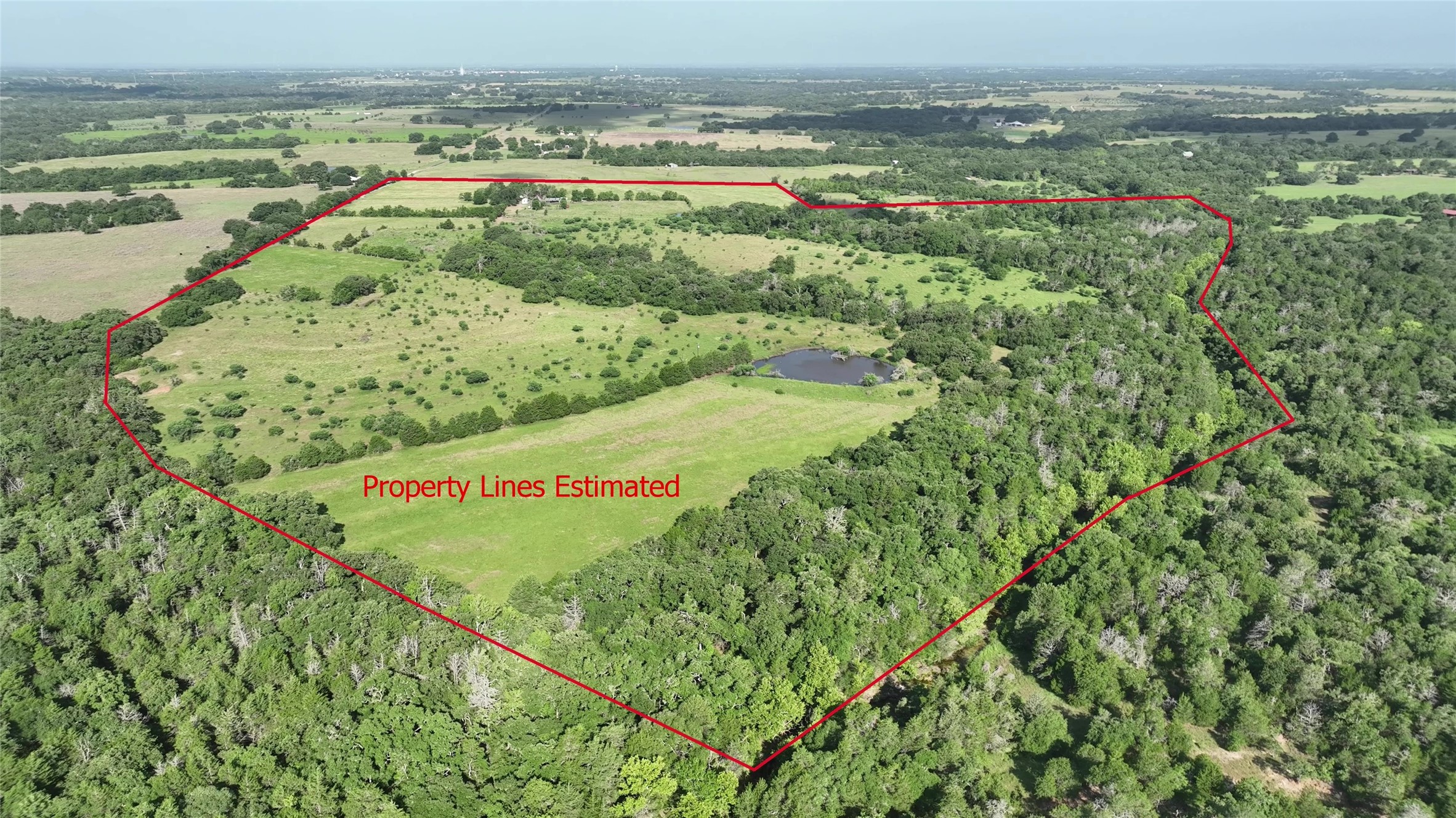 1649 County Road 209 Weimar, TX 78962 - Photo 3 of 27 a view of a field with an ocean view