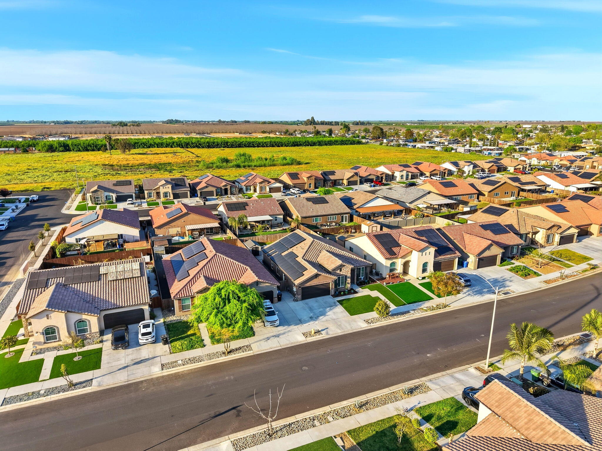 756 Strada Street Lemoore, CA 93245 - Photo 45 of 53 an aerial view of multiple house