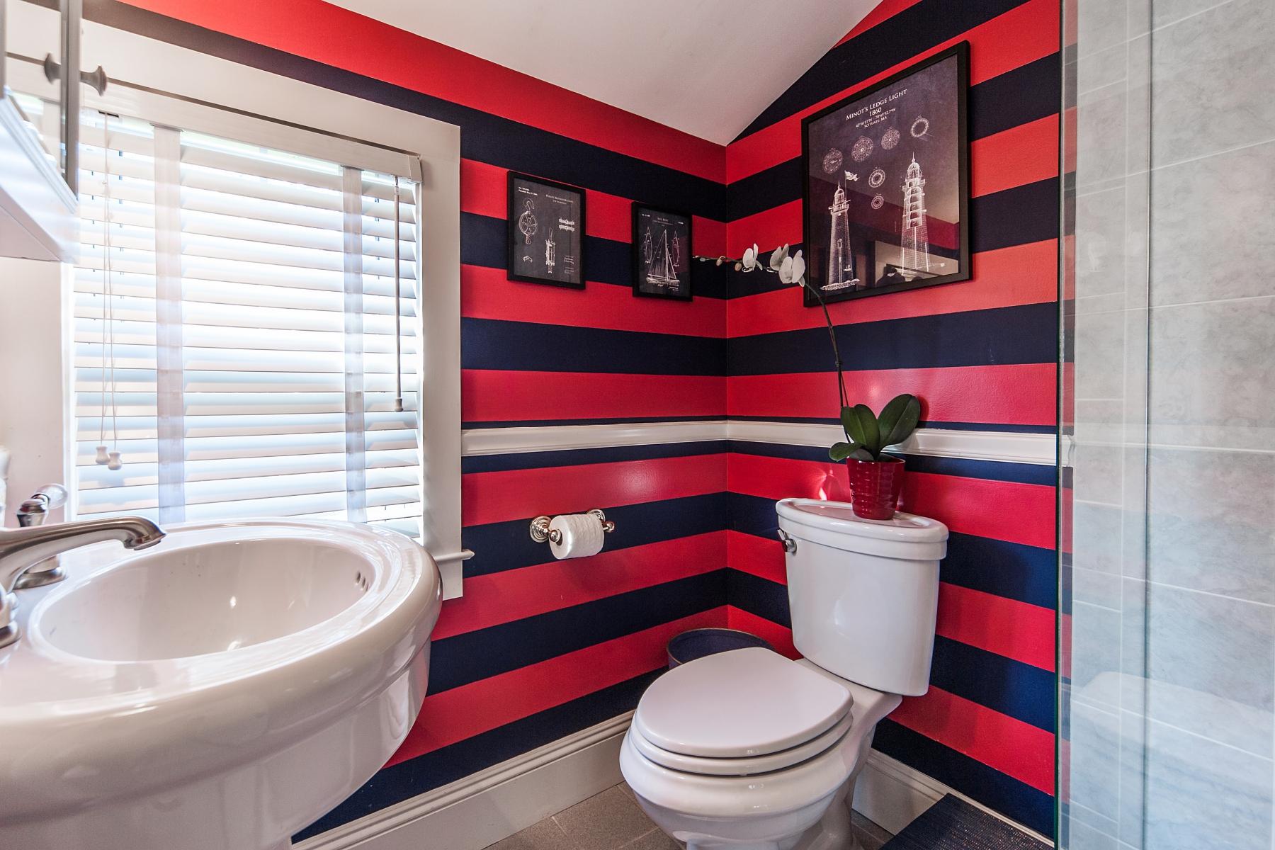 67 Relihan Road Darien, CT 06820 - Photo 12 of 25 a bathroom with a sink and a toilet