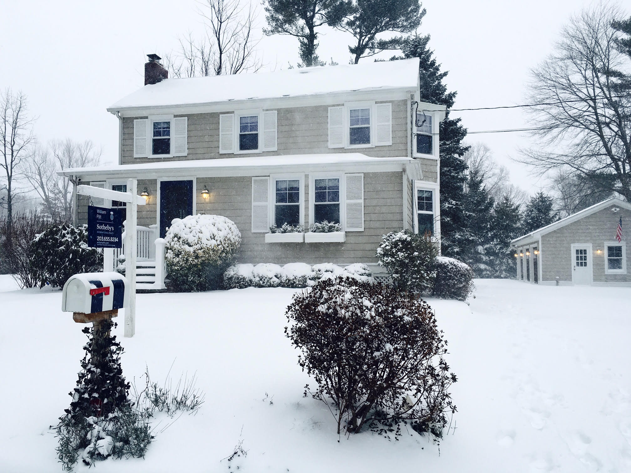 67 Relihan Road Darien, CT 06820 - Photo 22 of 25 a front view of a house with a yard