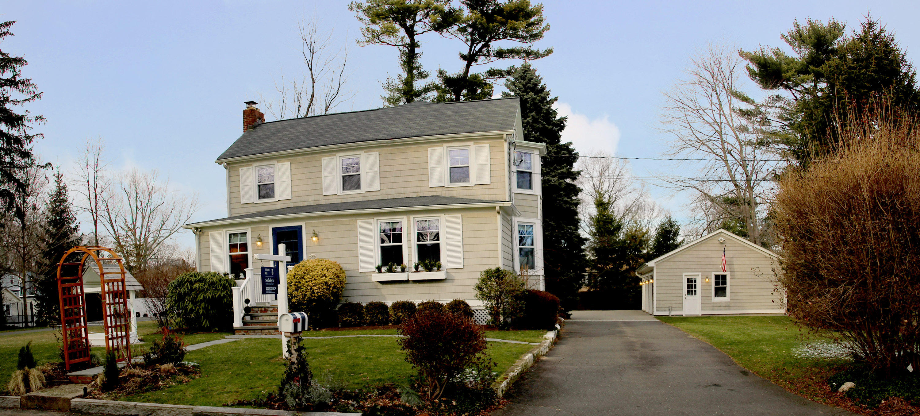 67 Relihan Road Darien, CT 06820 - Photo 23 of 25 a front view of a house with a yard