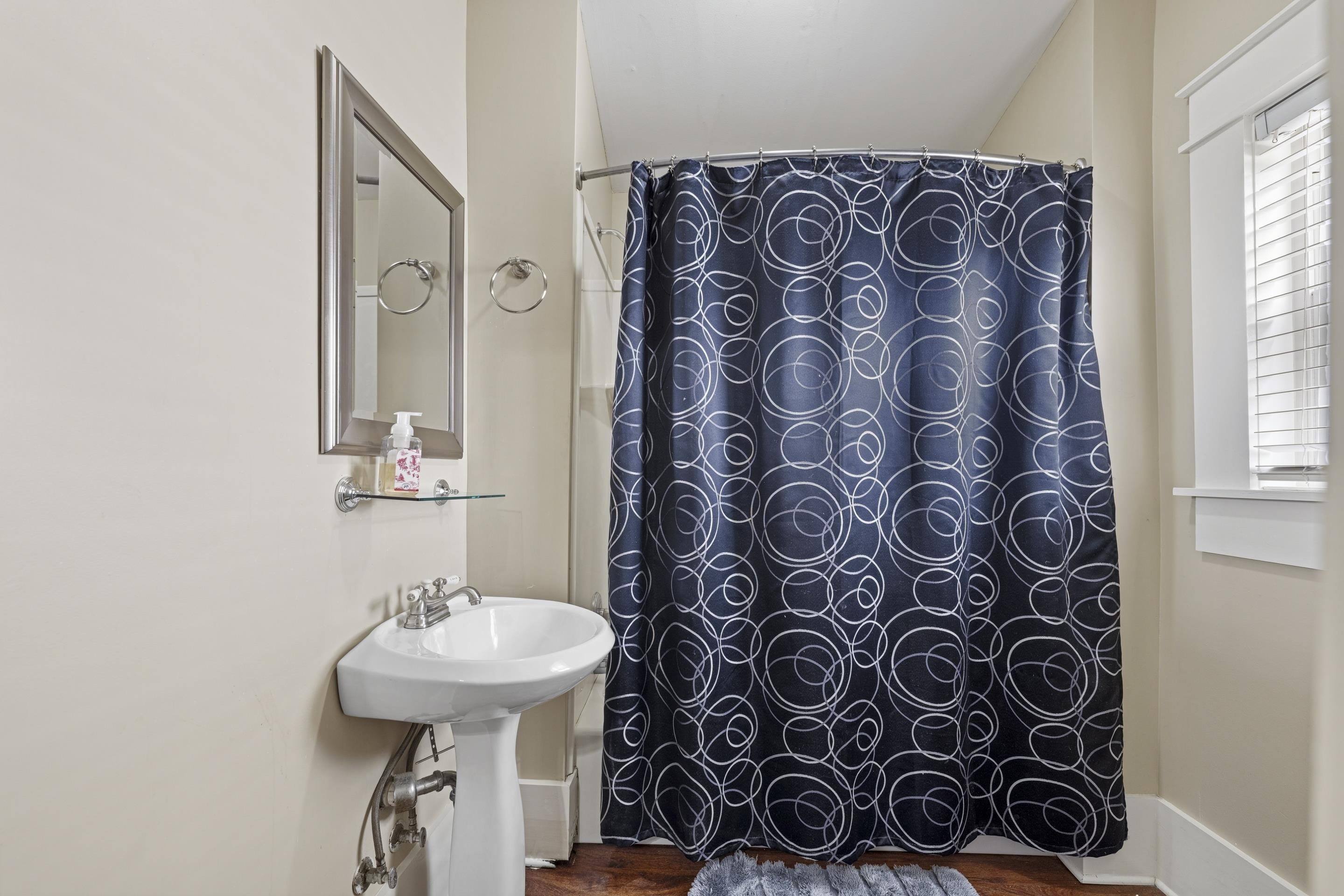 12601 Harrell Road Arlington, TN 38002 - Photo 22 of 40 a bathroom with a sink and a mirror