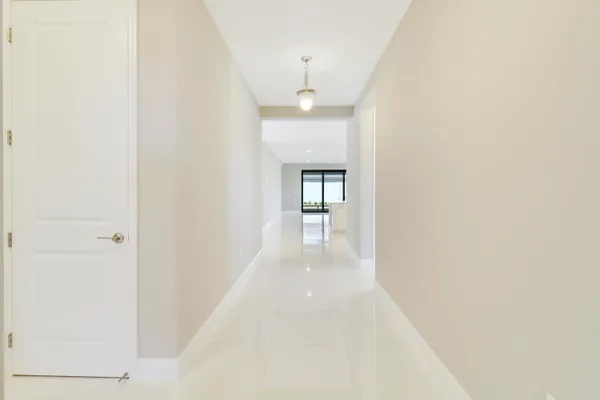 a kitchen with stainless steel appliances granite countertop a sink a stove top oven a counter space and cabinets