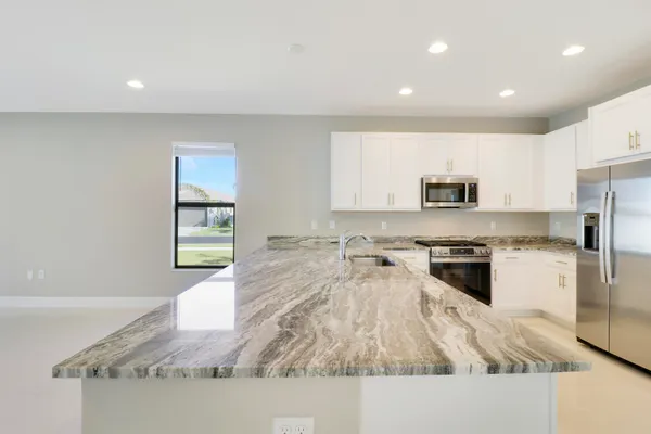 a view of an empty room with a sliding door