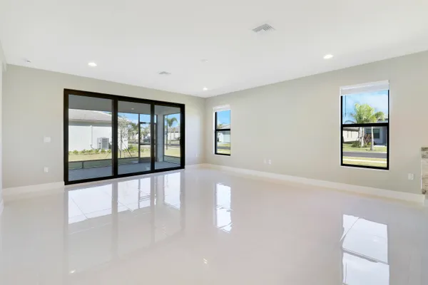 an aerial view of a house with a ocean view