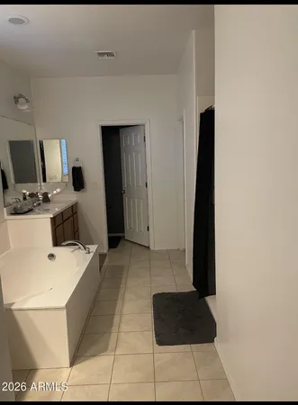 a room with a couch and a stove top oven