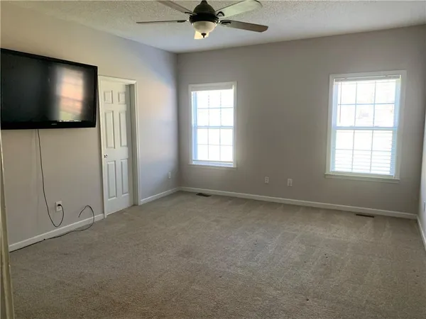 an empty room with windows