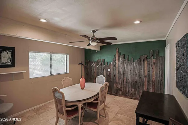 a kitchen with stainless steel appliances kitchen island granite countertop a refrigerator and a stove