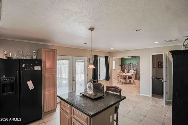 a room with furniture and wooden floor