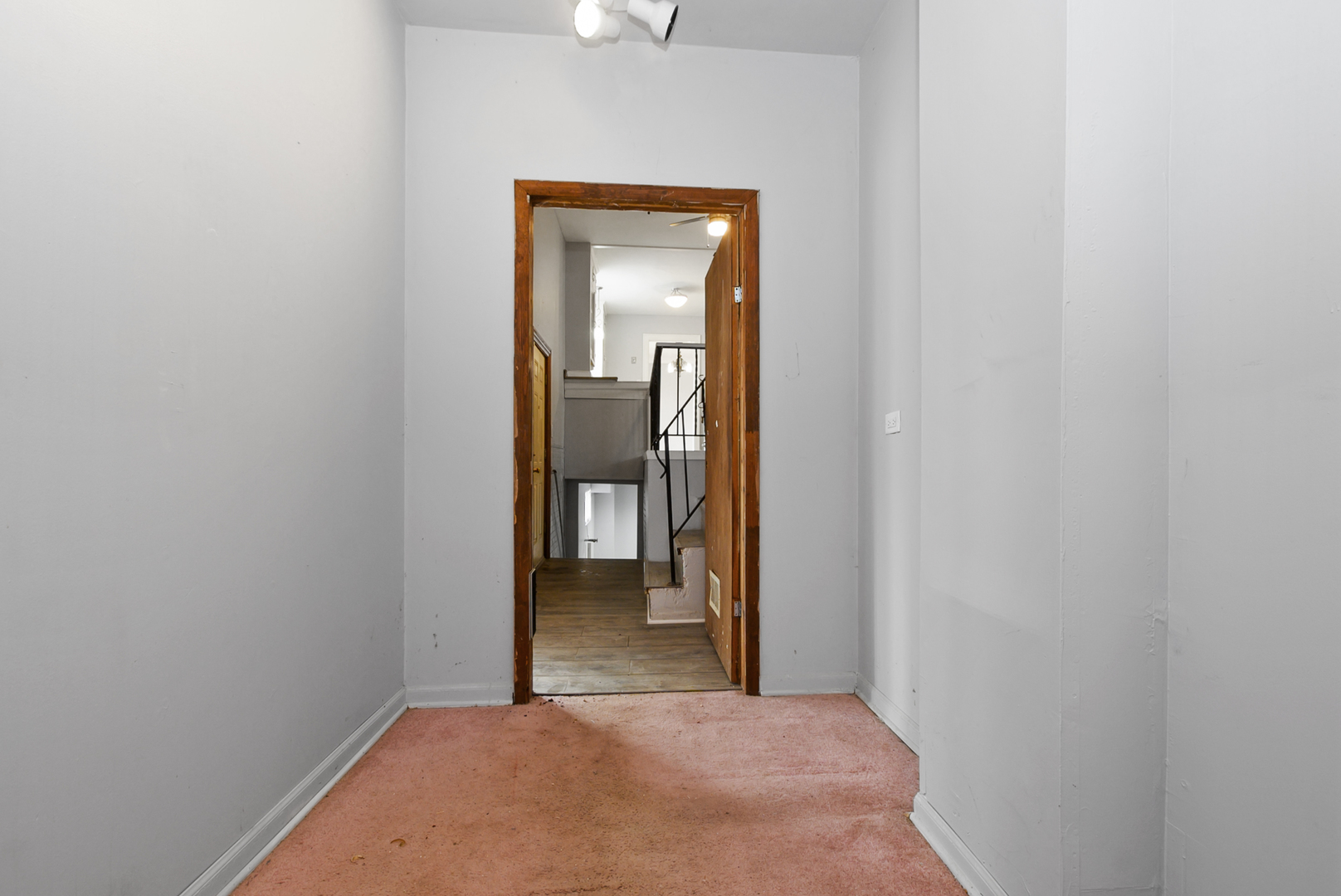 14823 Grant Street Dolton, IL 60419 - Photo 27 of 37 a view of a hallway with wooden floor
