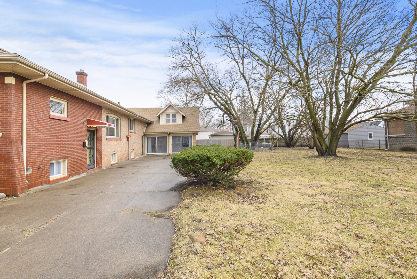 14823 Grant Street Dolton, IL 60419 - Photo 4 of 37 a view of a house with a yard