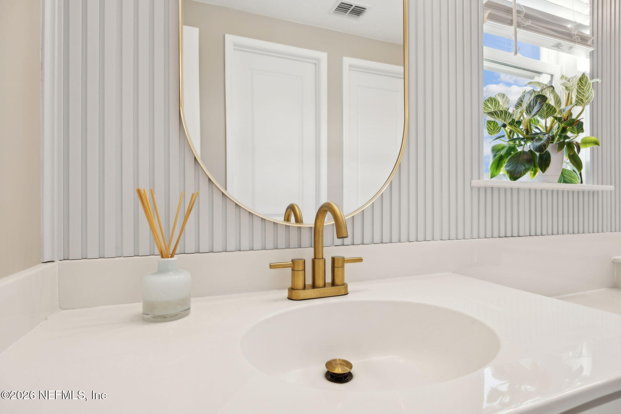 668 Rum Runner Way St. Johns, FL 32259 - Photo 31 of 81 a bathroom with a sink and a window