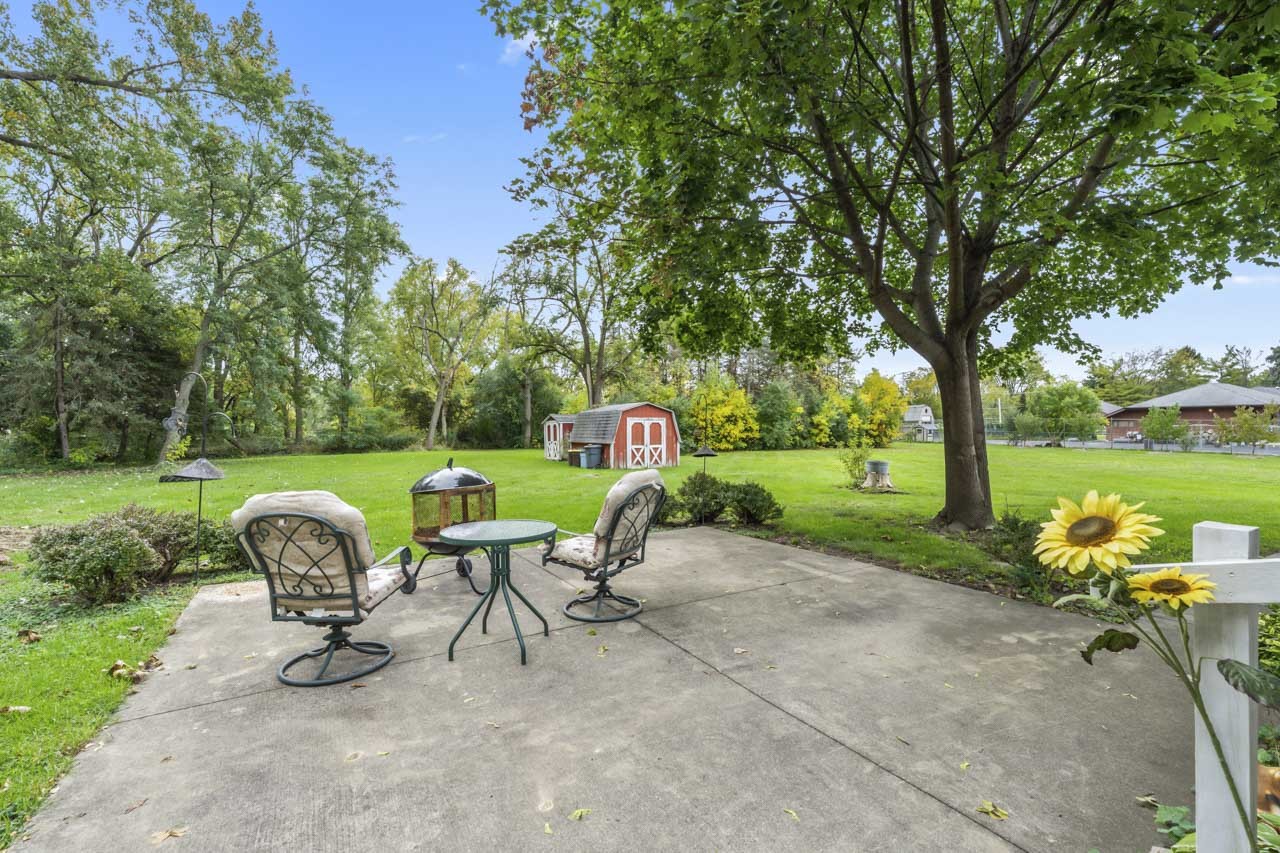 245 Bradwell Road Inverness, IL 60010 - Photo 28 of 43 a view of a garden with furniture