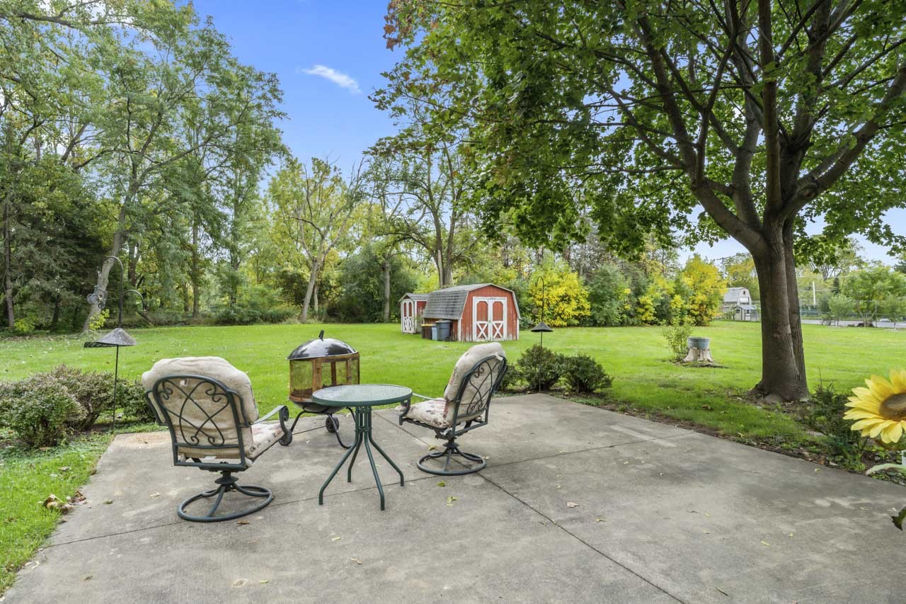 245 Bradwell Road Inverness, IL 60010 - Photo 29 of 43 a view of a two chairs in a park