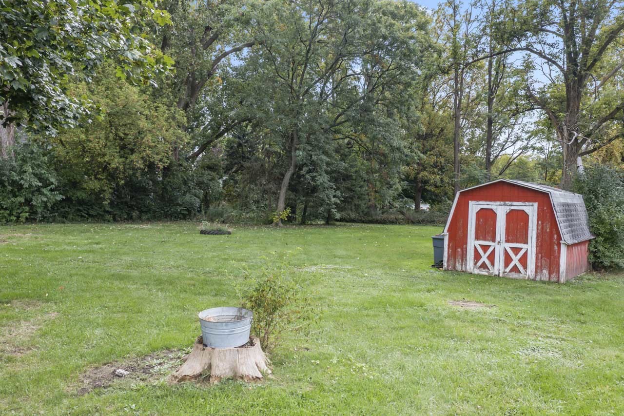 245 Bradwell Road Inverness, IL 60010 - Photo 30 of 43 a view of a back yard of the house with green space