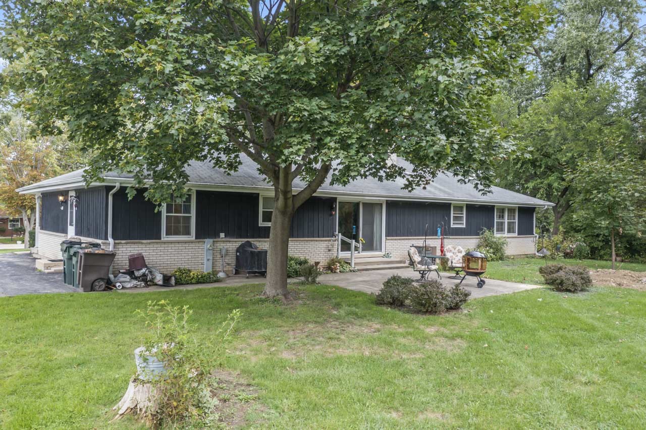 245 Bradwell Road Inverness, IL 60010 - Photo 31 of 43 a front view of house with yard and outdoor seating