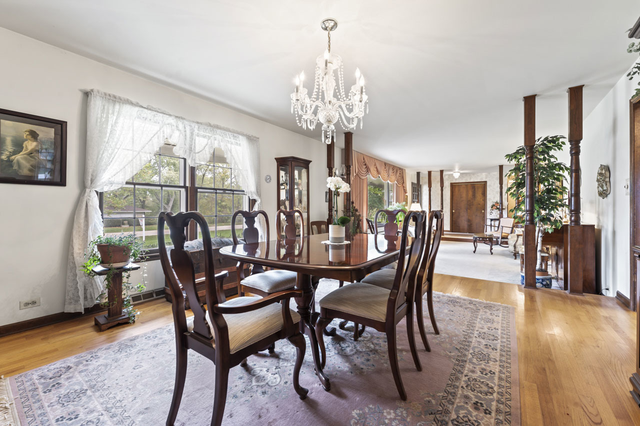 245 Bradwell Road Inverness, IL 60010 - Photo 9 of 43 a view of a dining room with furniture window and wooden floor