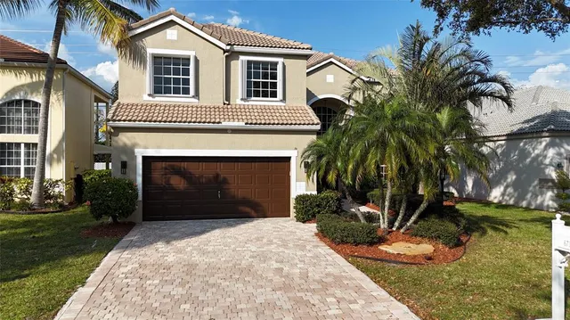 a view of entryway and wooden floor
