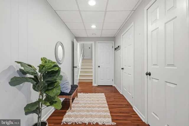 a bedroom with bed and a window