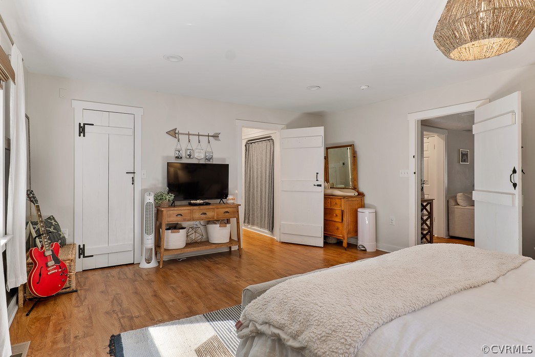 4748 Wedgemere Road Chesterfield, VA 23832 - Photo 19 of 35 a bedroom with furniture and a flat screen tv