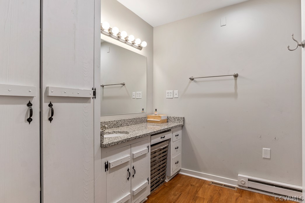 4748 Wedgemere Road Chesterfield, VA 23832 - Photo 20 of 35 a bathroom with a granite countertop sink a shower and a mirror
