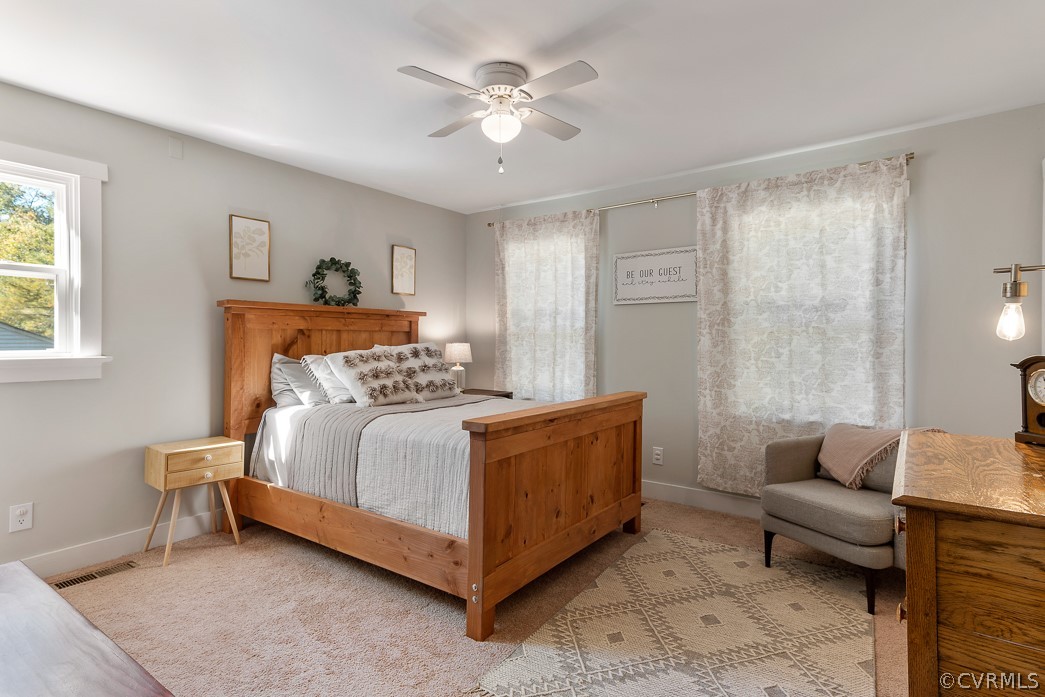 4748 Wedgemere Road Chesterfield, VA 23832 - Photo 21 of 35 a bed room with a bed and a couch