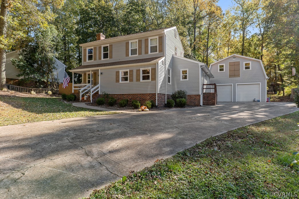4748 Wedgemere Road Chesterfield, VA 23832 - Photo 35 of 35 a front view of a house with a yard and garage