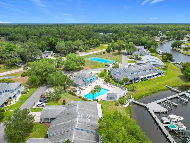 an aerial view of a house with a garden