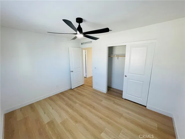 a view of empty room with windows