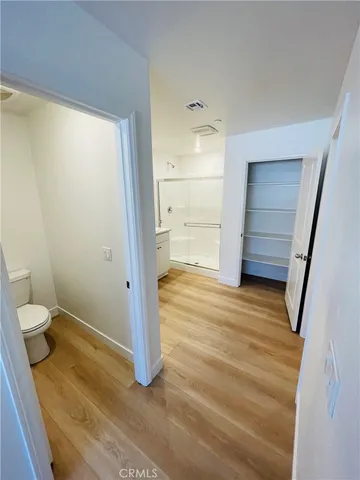 a view of entryway with wooden floor