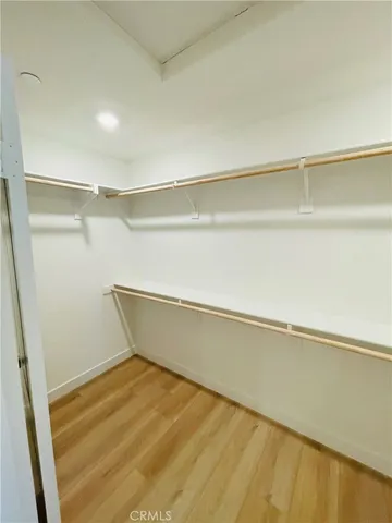 a view of an house with backyard space and balcony