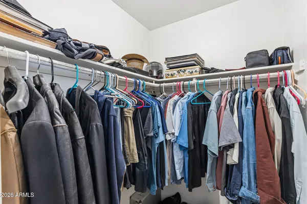 a bathroom with a sink vanity granite and a mirror