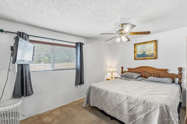 a bathroom with a sink vanity and a mirror