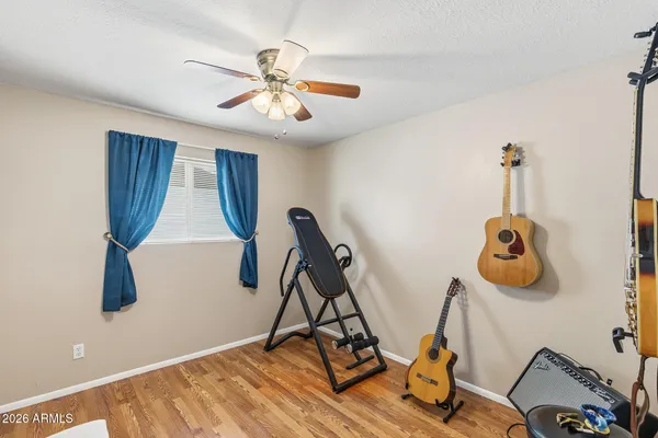 a kitchen with granite countertop a stove sink and cabinets