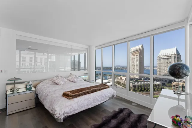 a bed room with a bed and a couch