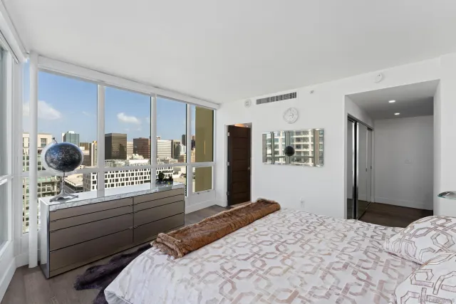 a blue bench sitting in front of a building