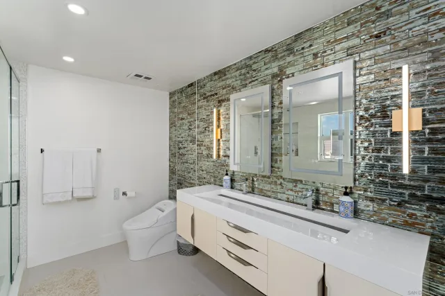 a view of a lake with a city