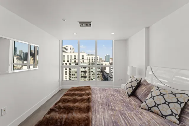 a view of city with tall buildings