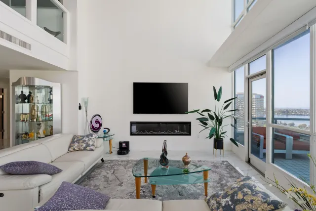 a living room with furniture and a table