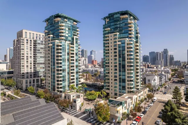 a view of a city with tall buildings