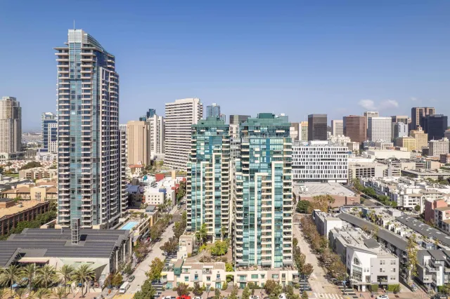 a view of a city with tall buildings